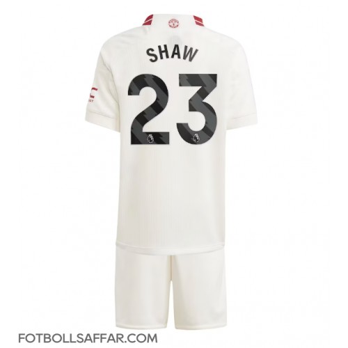 Manchester United Luke Shaw #23 Tredje Dräkt Barn 2023-24 Kortärmad (+ Korta byxor)
